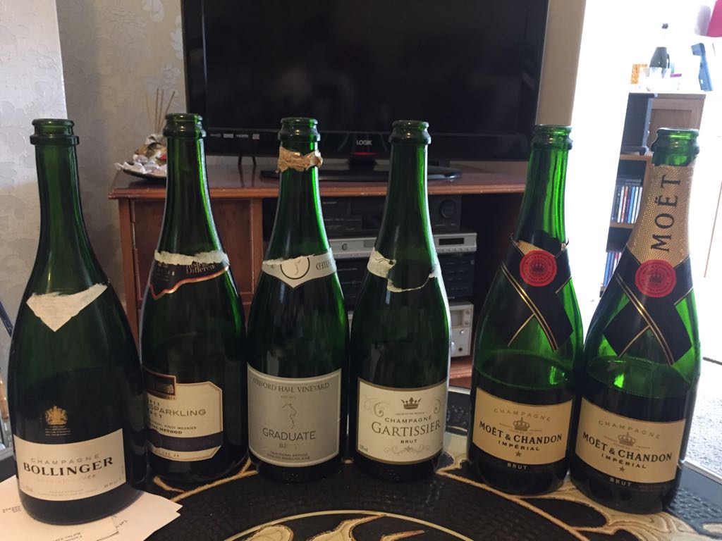 line up of luxury champagne bottles