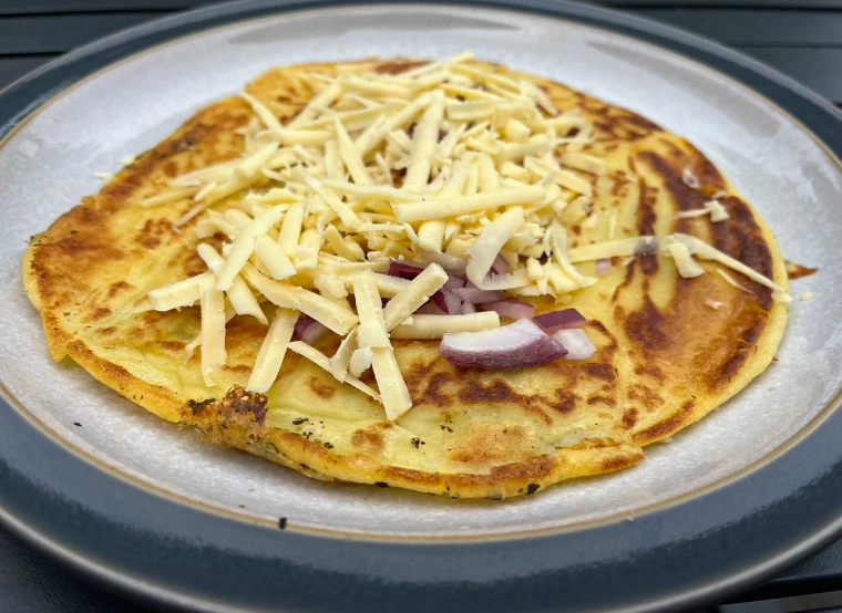 gluten-free pancake with cheese and onion