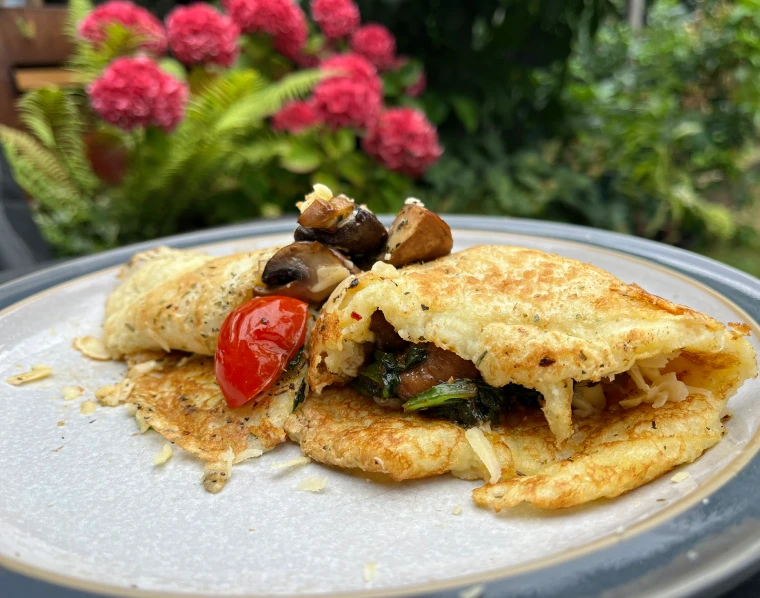 gluten-free pancake with mushroom and tomato