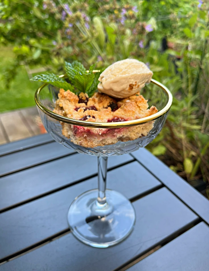 gluten free rhubarb and raspberry crumble bars in glass