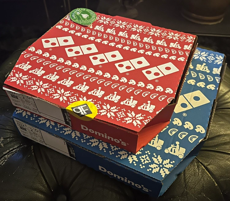 dominos gluten free pizza in box with lid open