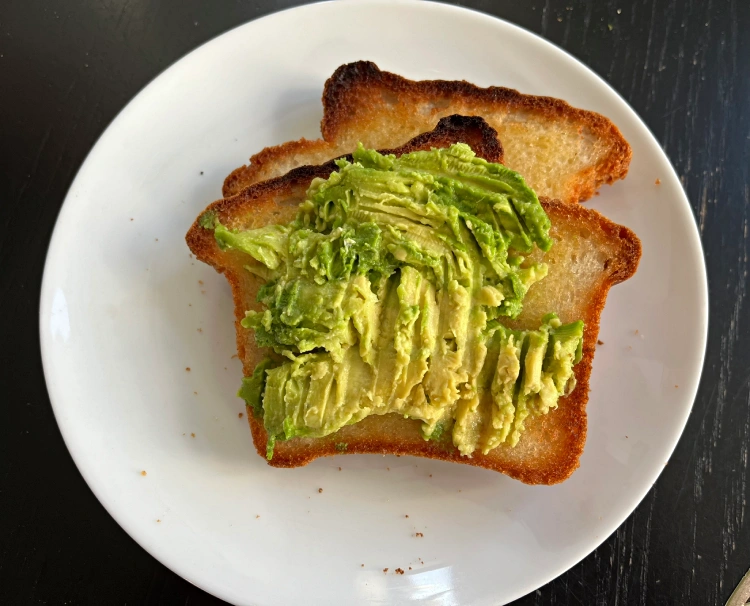 gluten free white bread slices with smashed avocado