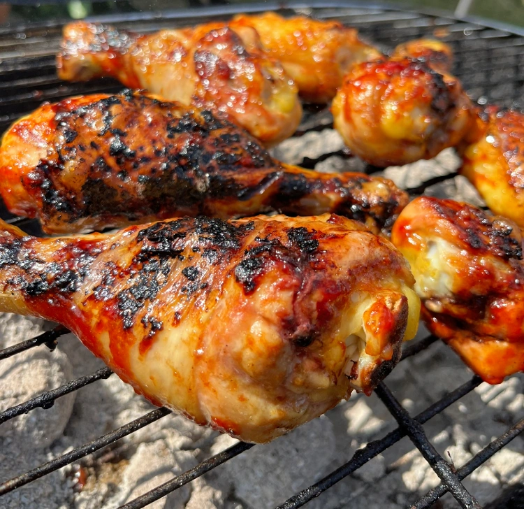 gluten-free barbecue chicken cooking on grill