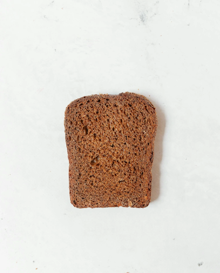 gluten free slice of bread on a table surface